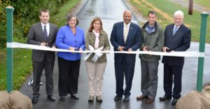 County and State Officials cut the ribbon on the newest trail segment last year. Left to right:  Steve Soles,  Kathi Cozzone; PA Secretary Ellen Ferretti; Terence Farrell; Dave Stauffer,  and Steve Fromnick