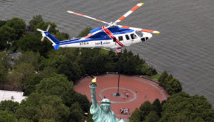 The Sikorsky SH-76 flies over the Statue of Liberty. via--Philly.com, Sikorsky