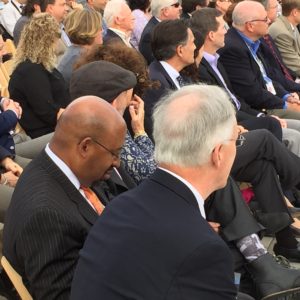 Philadelphia Mayor Michael Nutter sits next to Saint-Gobain CEO John Crowe before speaking to the crowd of 500 gathered at this morning's ribbon cutting.