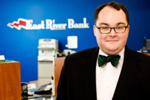 Christopher P. McGill, President & CEO of East River Bank.