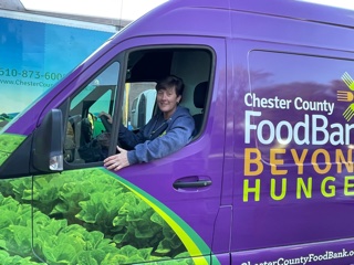 Andrea Youndt in a Chester County Food Bank's box truck