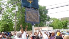 A crowd celebrates installation of a historical marker for the Nile Swim Club in Yeadon.