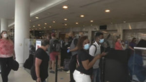 A crowd waits in line at the Philadelphia International Airport