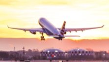 Airplane lifting off from Philadelphia International Airport.