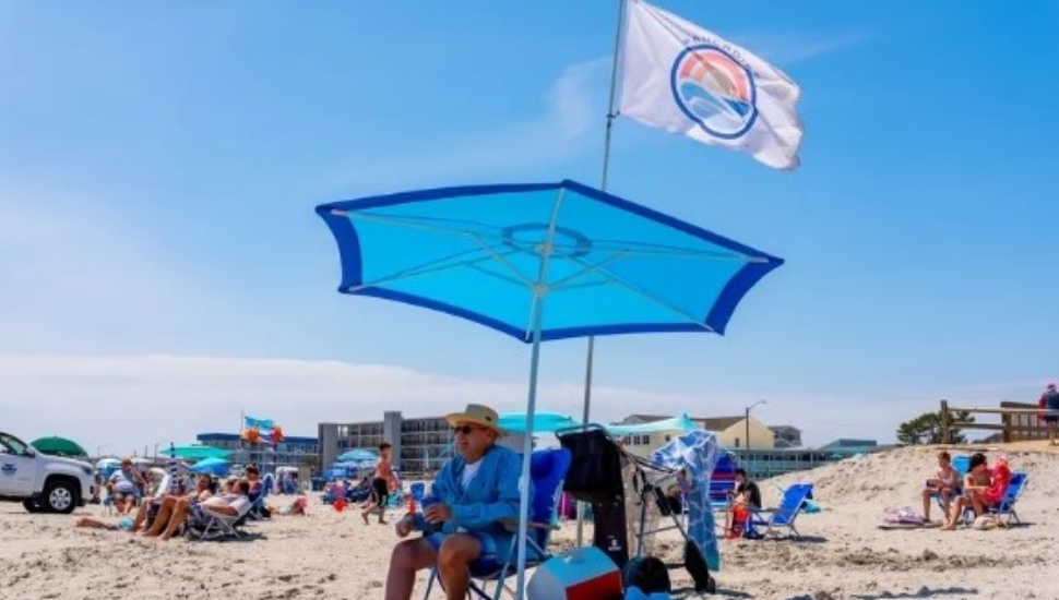 George Panco of Ridley has his custom-made flag at the shore.