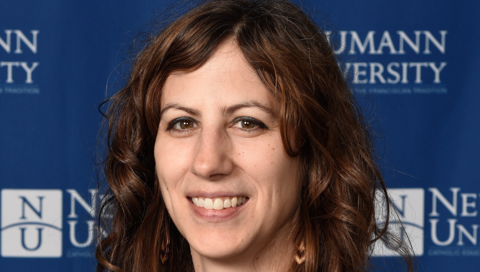 Kerry Hustwit, one of three Neumann faculty teaching visual literacy in a Film Studies program.