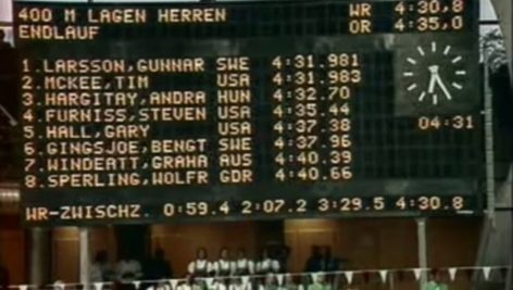 Scoreboard showing swimmer Tim McKee's final score at the 1972 Munich Olympics.