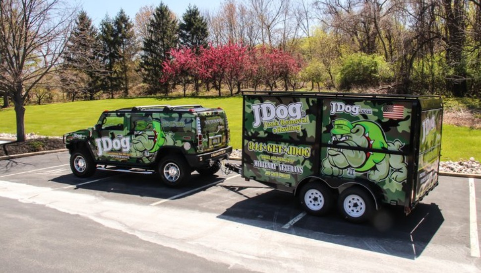 A truck and a trailer from JDog Junk Removal & Hauling.