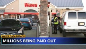 The front entrance and gas pumps at a Wawa store. Wawa is compensating customers affected by a data breach.