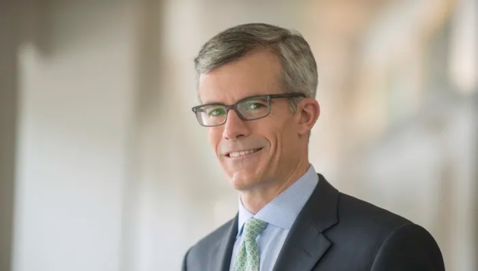 man with glasses in suit
