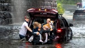 family rescued from floodwaters