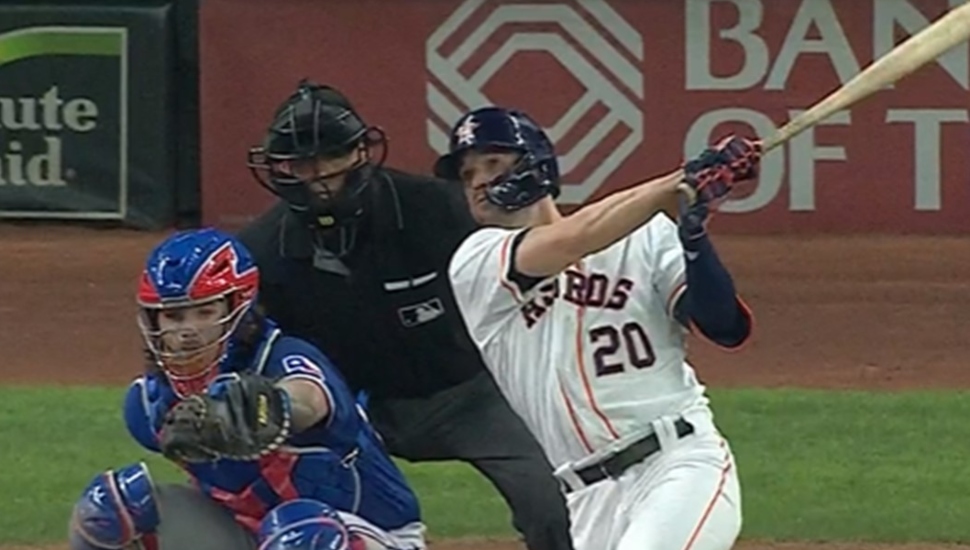 baseball player hitting homer