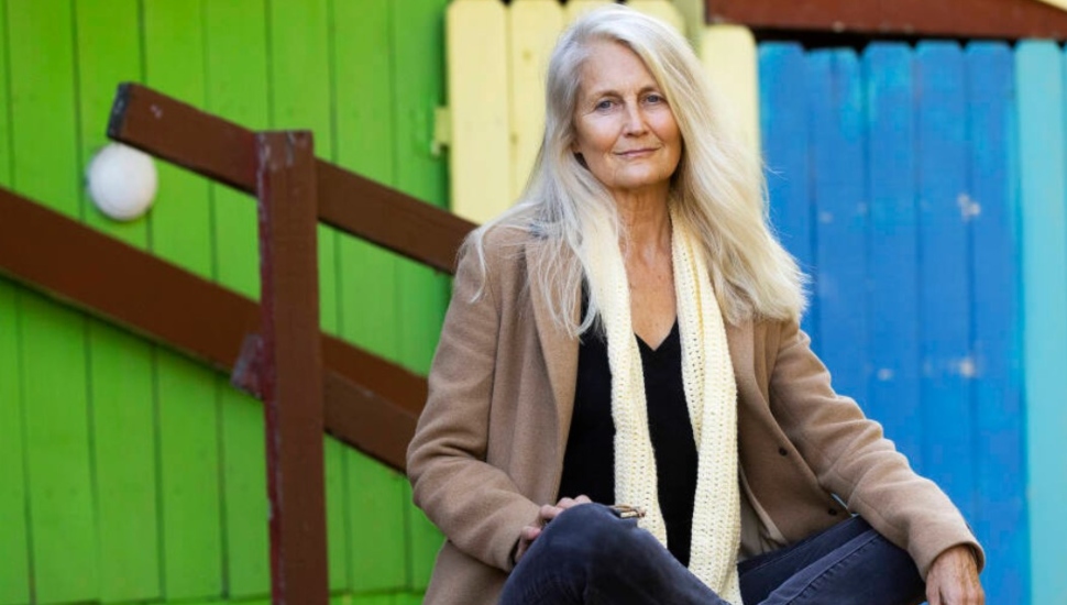 woman sitting cross-legged