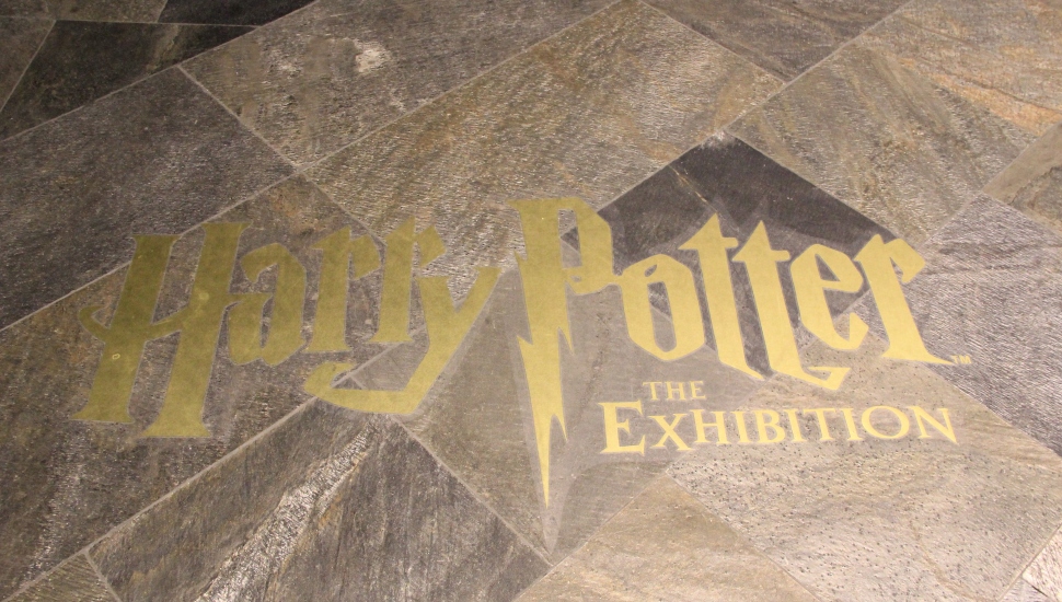 gold words on a stone floor