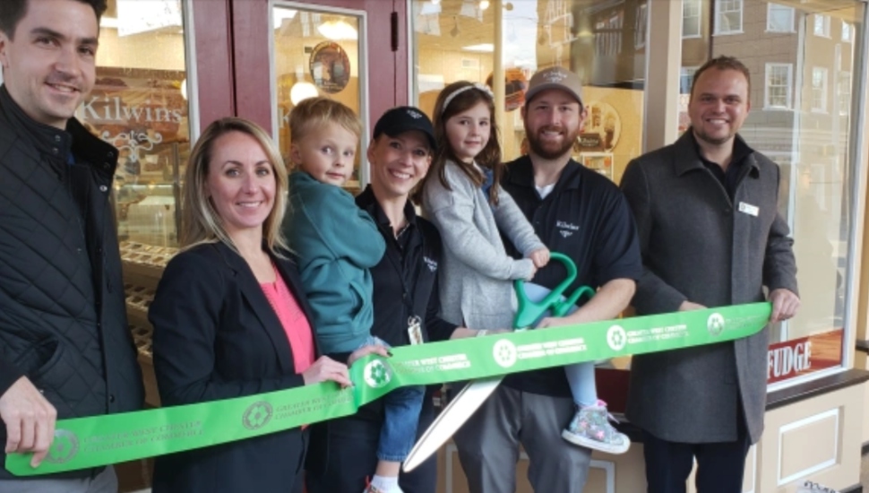 people at a ribbon-cutting