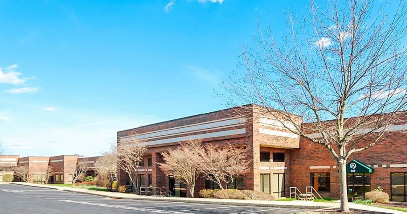 brick building against blue sky