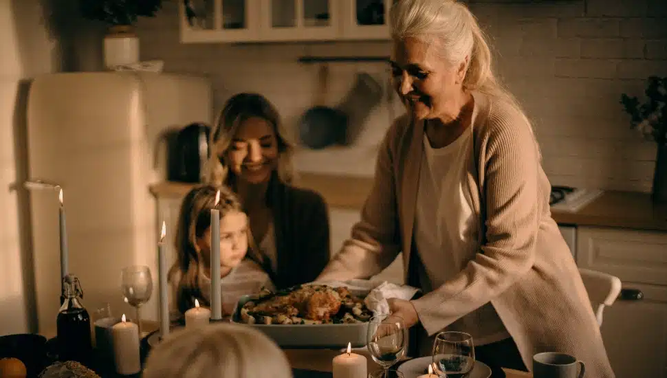 woman holding a pan with food