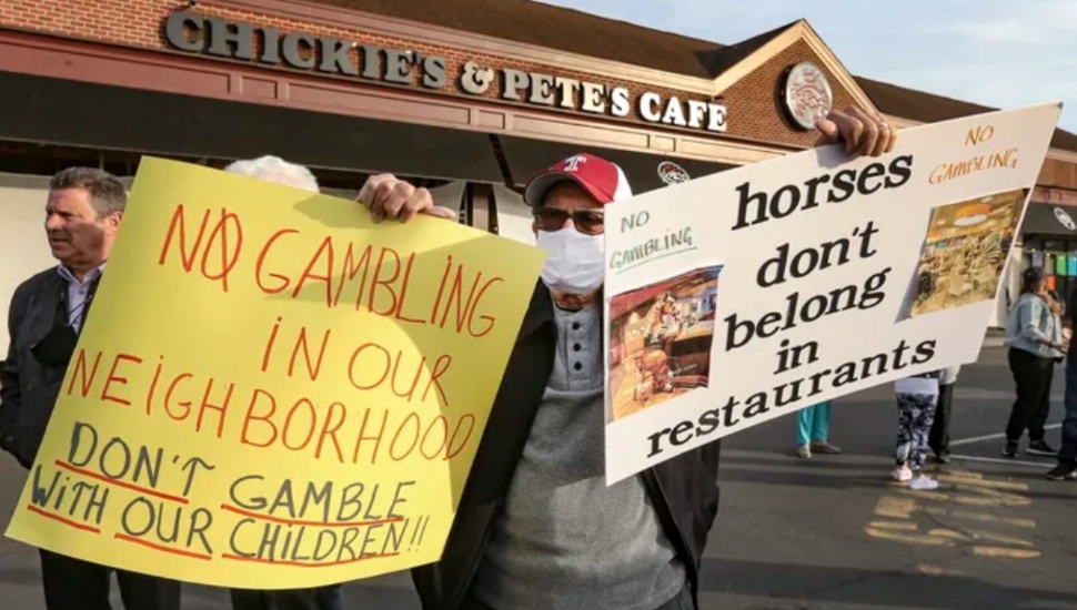 protestors at a restaurant