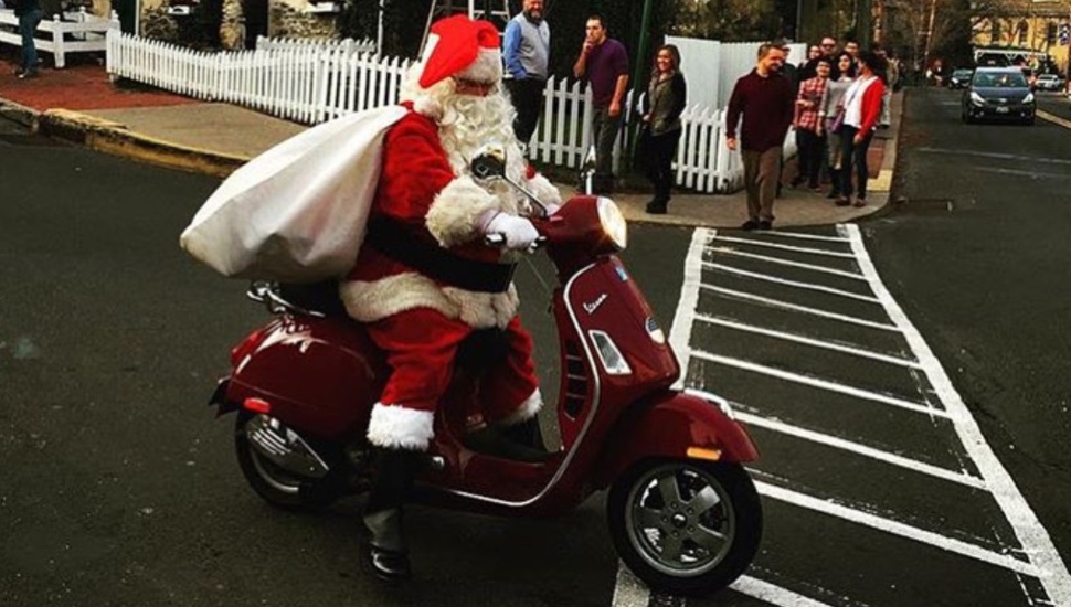 Man in red suit on motorcycle