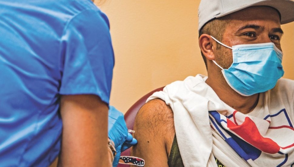 man receiving vaccine