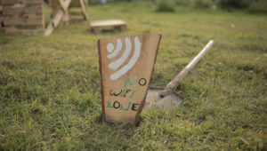 wooden sign in a lawn