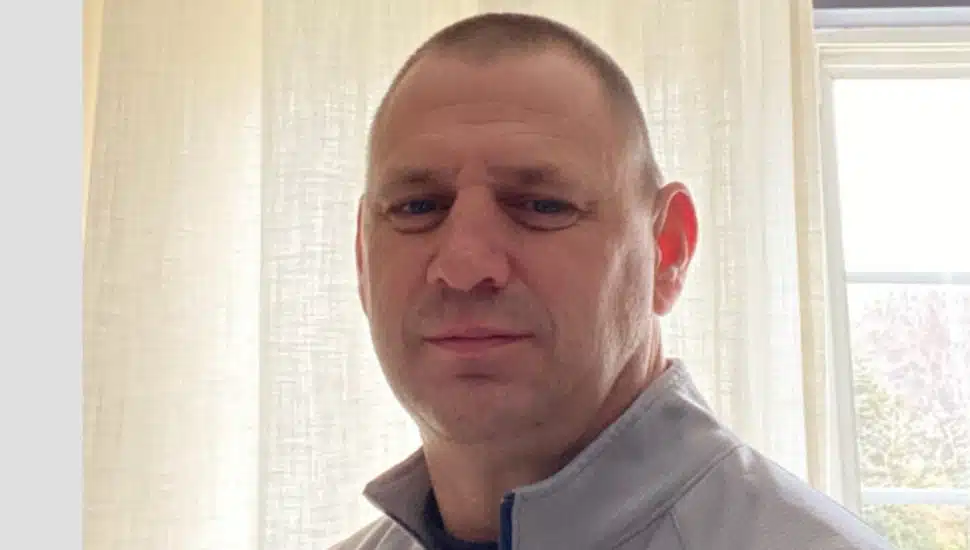 man in a gray jacket