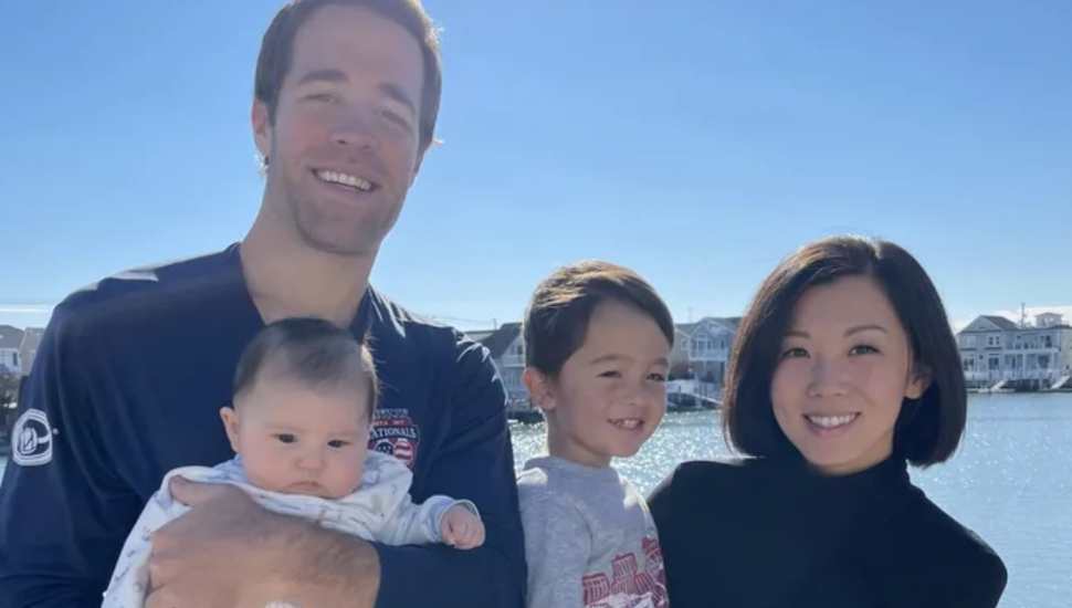 two adults with two children