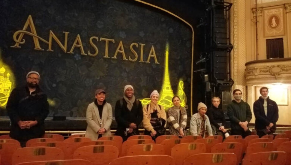 young adults in a theater