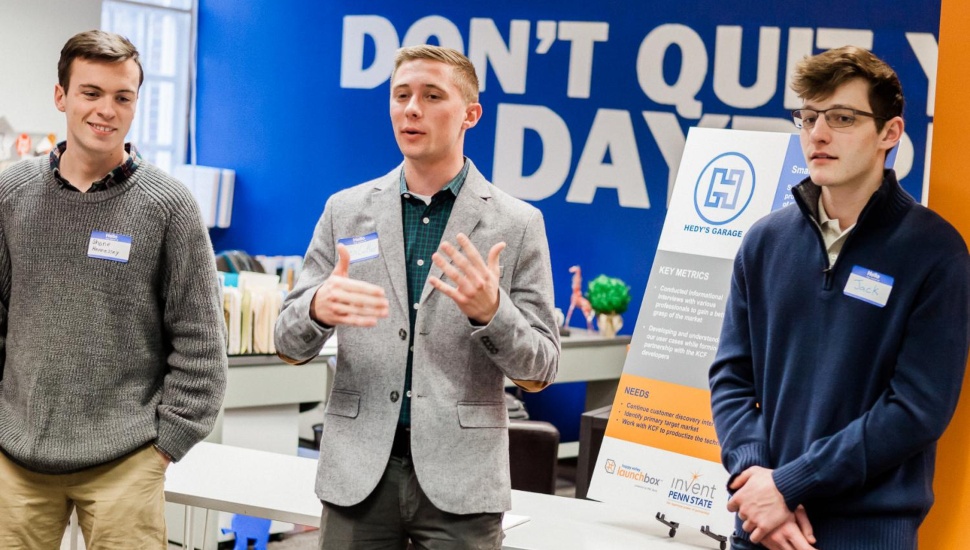 Three young entrepreneurs in the Idea TestLab pitching a business idea.