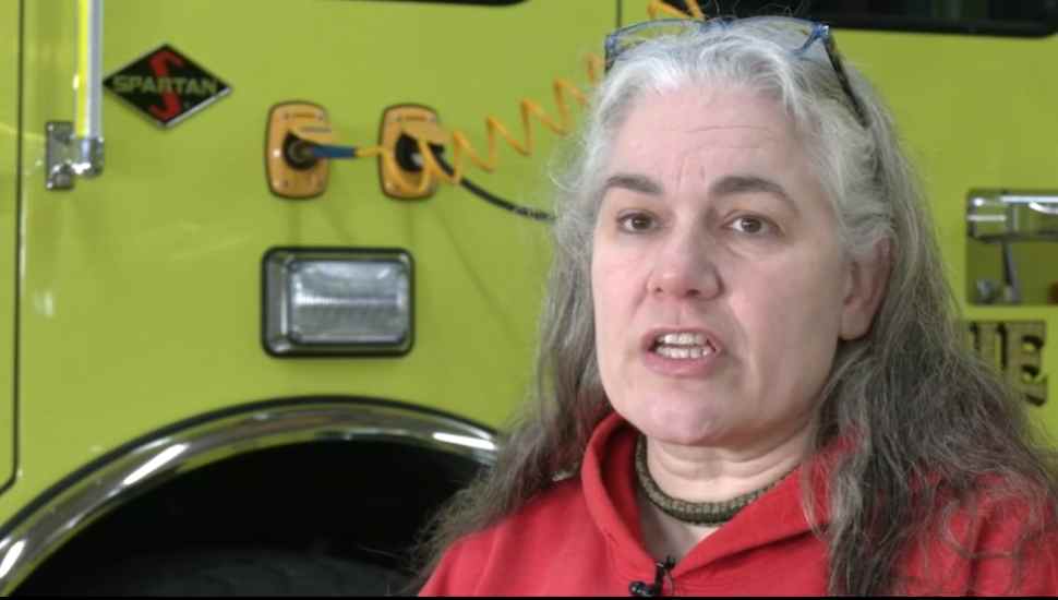 woman in red hoodie