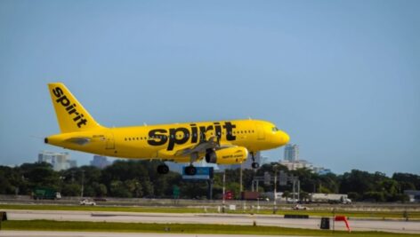 A Spirit airline jet that will soon be part of a new merged company with Frontier Airlines.