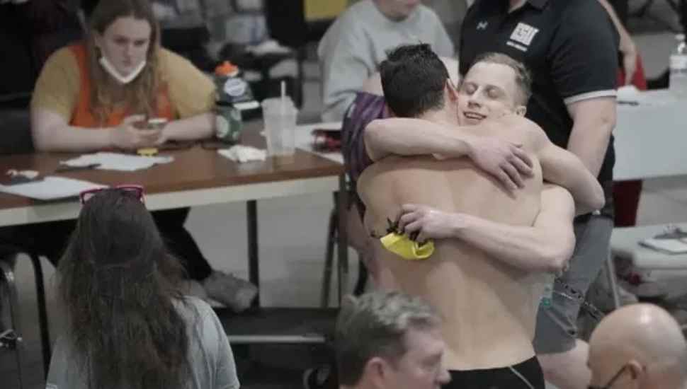 swimmers celebrating