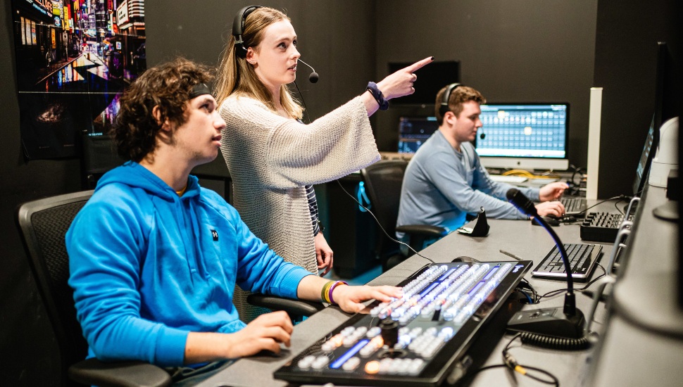 Amanda Cunningham in the control room at WNUW. Image via Neumann University.