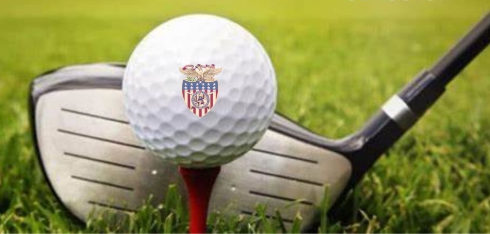 Golf club hitting a golf ball with the Valley Forge Military Academy & College logo.