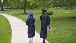 Two Penn Wood Brandywine graduates walking on campus.