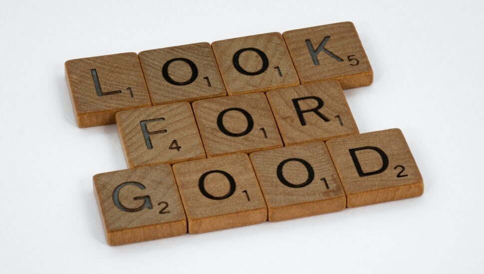 Scrabble tiles spell out 'look for good'.