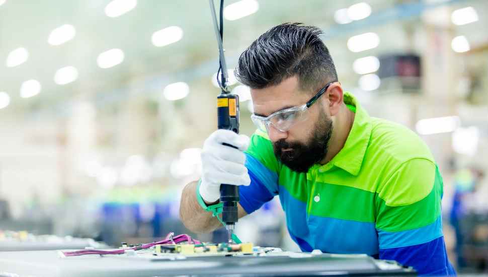 man with beard in colorful shirt