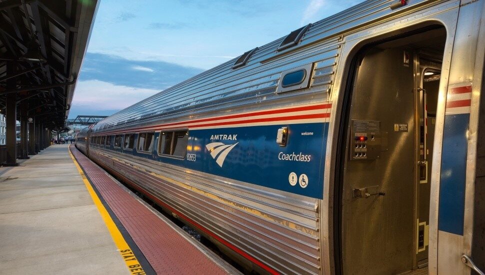 An Amtrak train pulling into a station