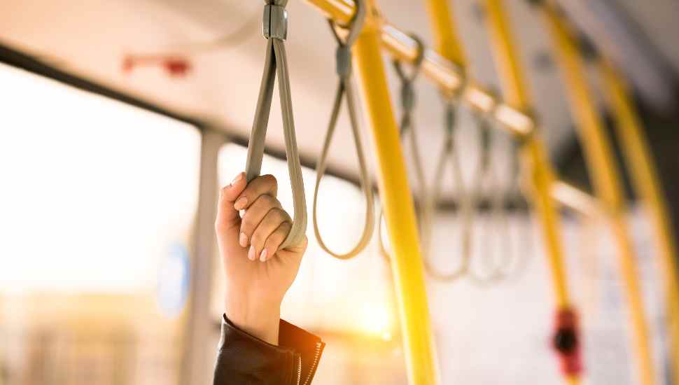 hand holding strap