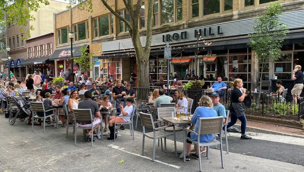people sitting outside at Iron Hill Brewery in West Chester
