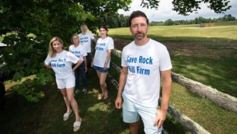resident wearing save Rock Hill Farm shirts