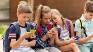 kids holding cellphones
