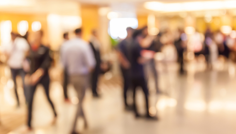 Blurred people at an event in a hall