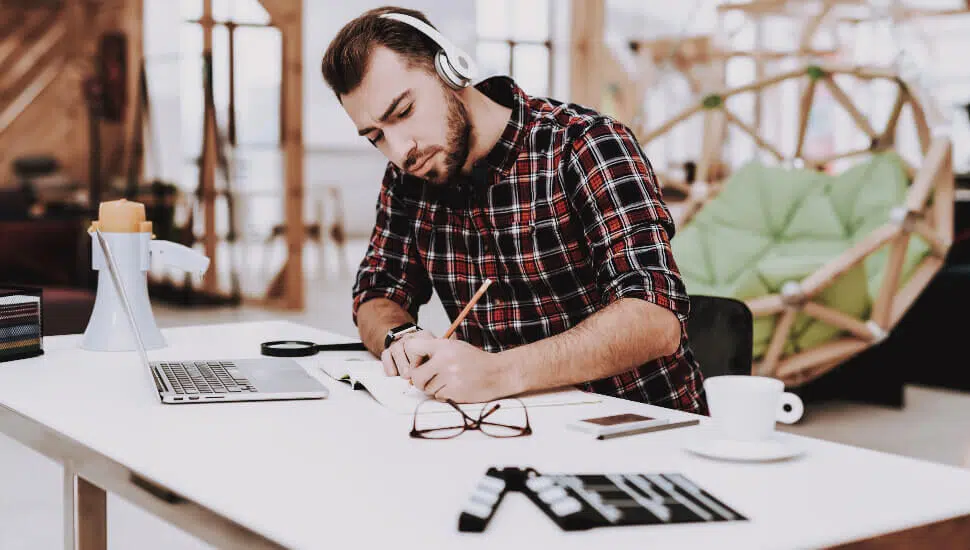Man Listening to music while working at home