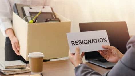a woman resigning her corporate position