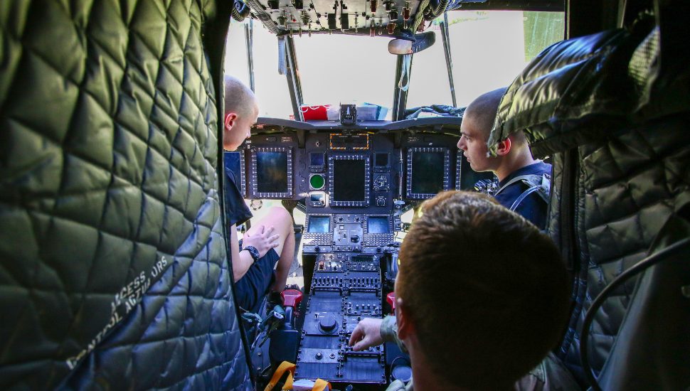 Cadets check out the interior of a helicopter