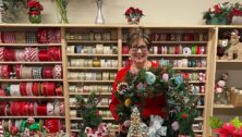 Fran Northrup, Floral Studio Chairperson, with an array of items her committee has created for the Holiday Bazaar.