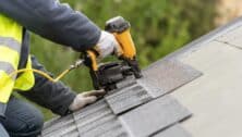 roofer fixing roof home repairs