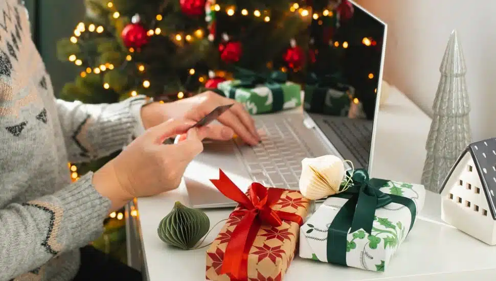person buying holiday presents online