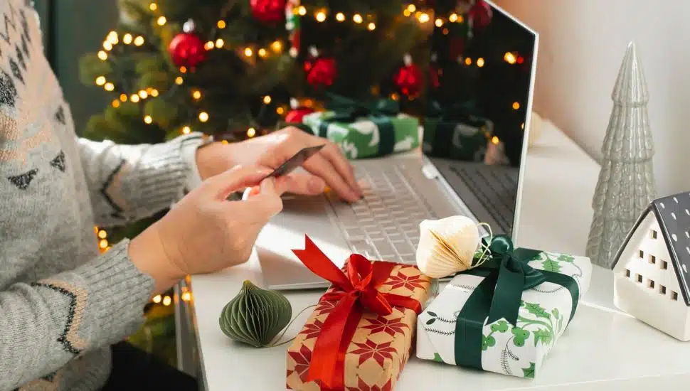 person buying holiday presents online